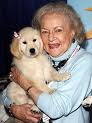 Betty White with puppy.635