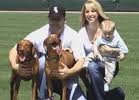 Mark Buehrle, wife, child and dogs