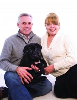 Susan and Gregg Sims with their dog junior