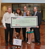 Trista Sutter presenting check to San Diego Humane Society