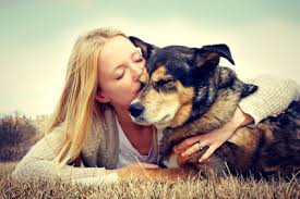 Woman Hugging Dog