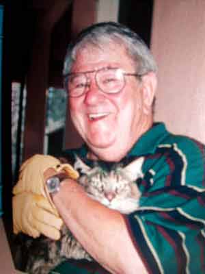 Buddy Hackett with cat