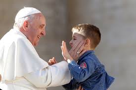 Pope Franics consoling kid