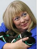 Bernann McKinney with two cloned dogs