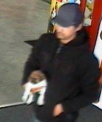 Man stealing puppy