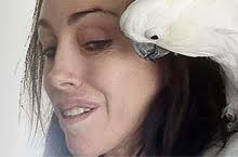 Heidi Fleiss with bird