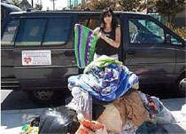 Eileen Smulson collecting items.659