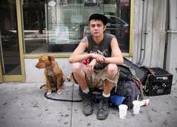 Panhandling with a dog.656