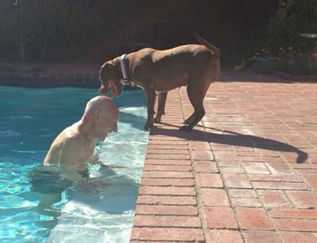 Sir Patrick Stewart and Ginger the foster Pitbull